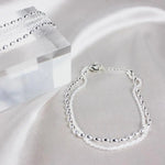 Set elegantnih srebrnih narukvica sa cirkonijumskim kamenjem